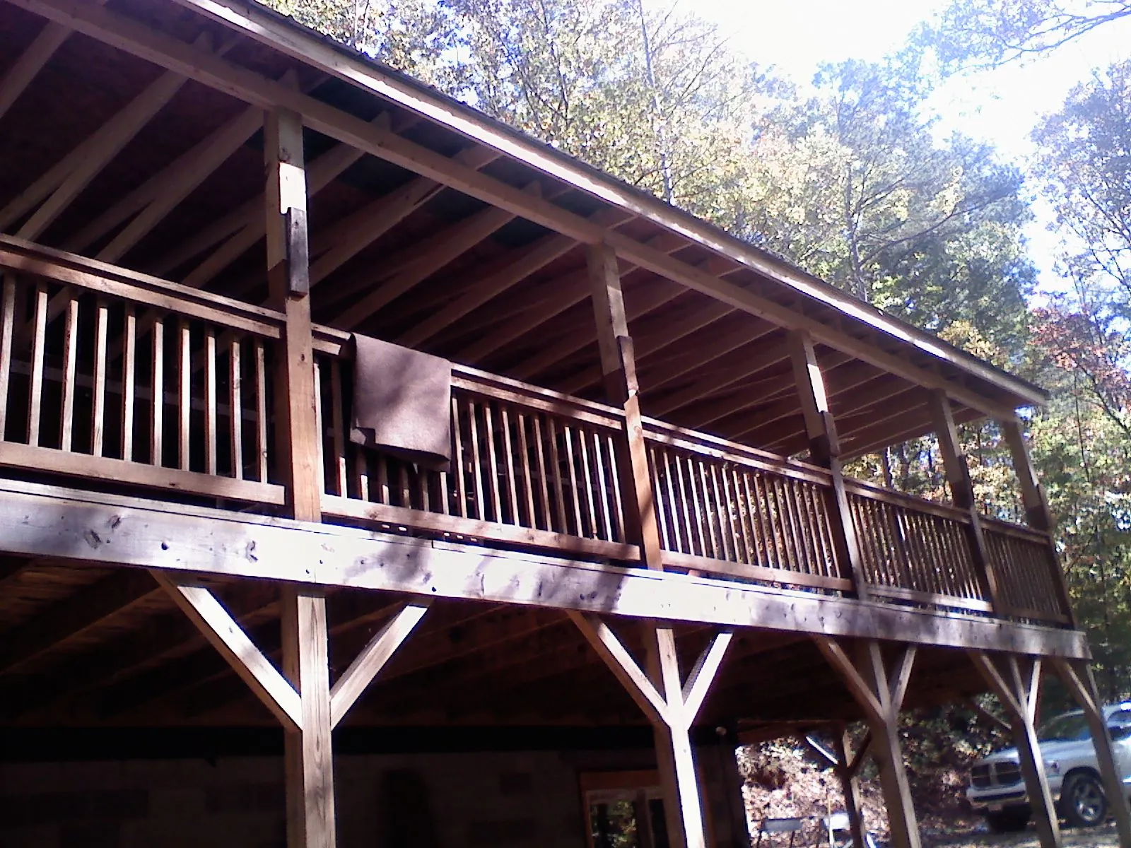 Timber framing under a new elevated porch and deck — Roof Leak Repair in Belleview by Roofing Brothers